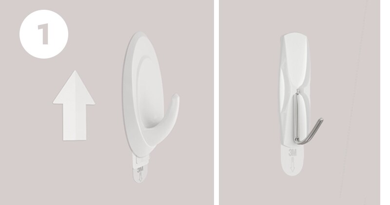 Step 1 of removing Command™ hook: slide hook up and off for two piece hooks
