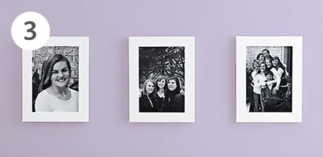 Photo frames attached with Command™ Picture Hanging Strips.
