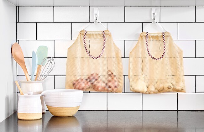 Image of a sink counter with hanging condiments using Command Hook