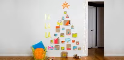 Create a wall Christmas tree with cards
