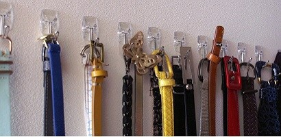 Organise belts with Command clear utensil hooks