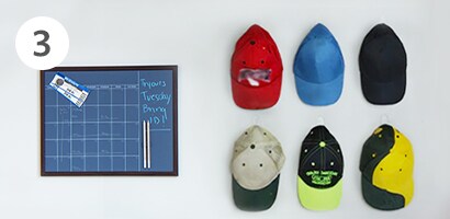 Baseball cap collection displayed with Command™ Clear Medium Hooks
