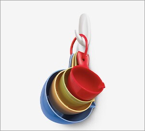 Hanging kitchen utensil using Command™ wire hooks