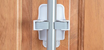Broom and mop organiser from Command