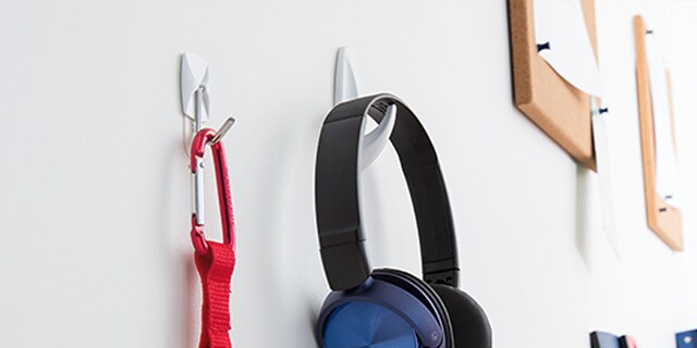 headphone and other accessories hung with 3M hooks for hanging