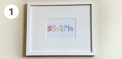 Framed image of the word selfie
